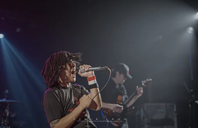 Vocalist singing into a microphone