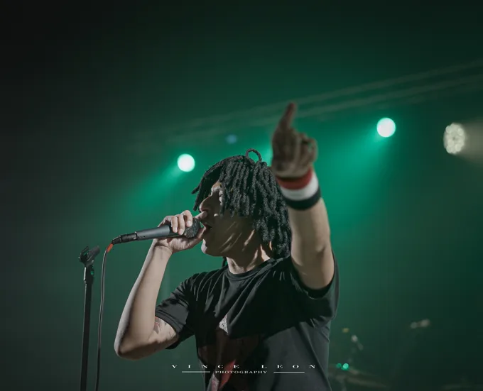Vocalist pointing toward the crowd